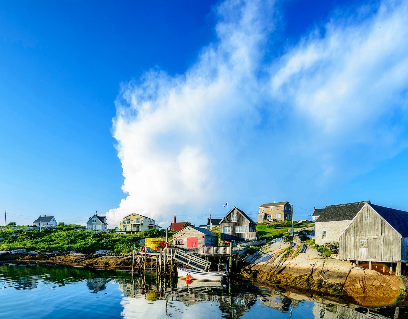 Charming coastal village with rustic houses and calm waters | MSC Cruises Charming coastal village with rustic houses and calm waters | MSC Cruises