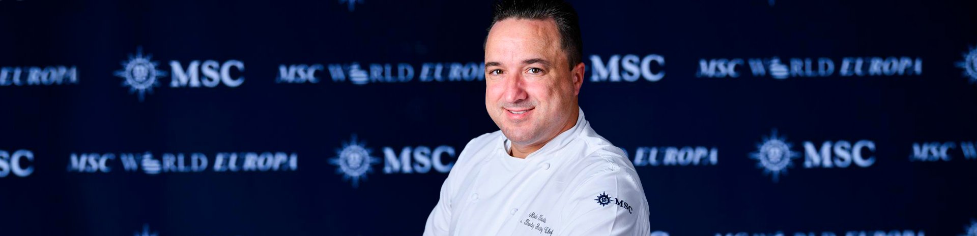 A chef in an MSC uniform at an MSC World Europa event | MSC Cruises A chef in an MSC uniform at an MSC World Europa event | MSC Cruises